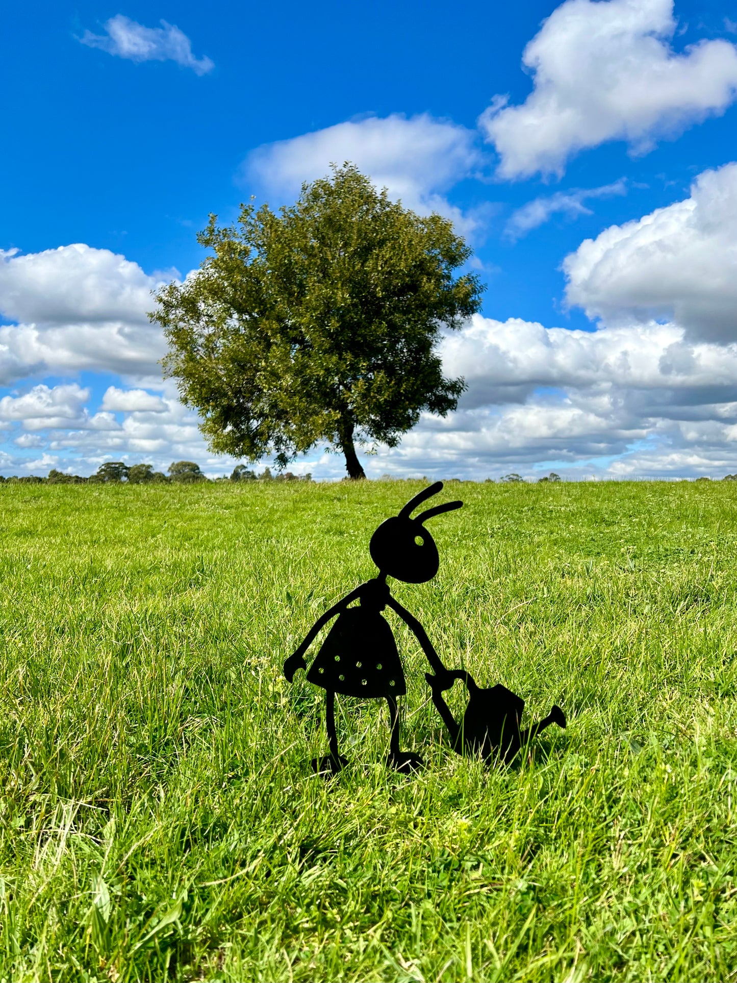 Ant with watering can